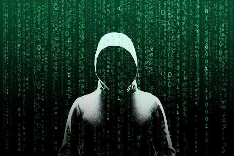 bigstock-Anonymous-Computer-Hacker-Over-297065068.jpg